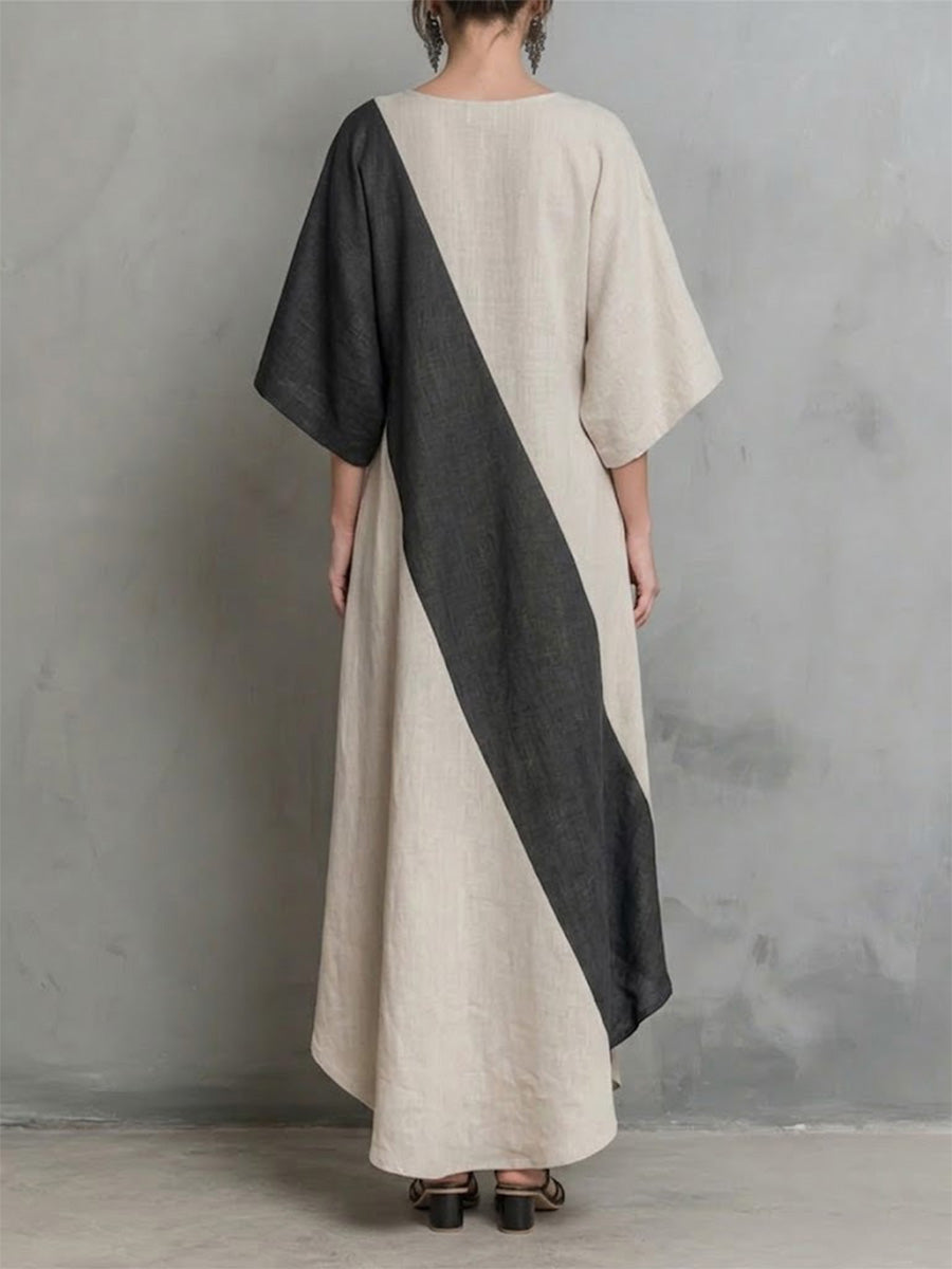 Long Cotton-linen Dress Featuring Diagonal Color-blocking, Batwing Sleeves, A V-neck, And An Asymmetrical Hem.