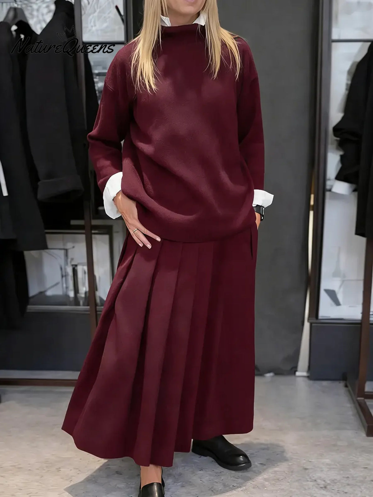 Women's Solid Color Stand-collar Long-sleeved Loose-fitting Knitted Top And High-waisted Loose A-line Skirt Set.