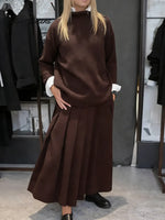 Women's Solid Color Stand-collar Long-sleeved Loose-fitting Knitted Top And High-waisted Loose A-line Skirt Set.