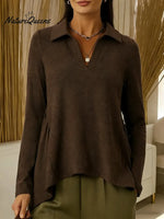 Women's Solid Color V-neck Long-sleeved Casual Loose-fitting Top With Irregular Hem.