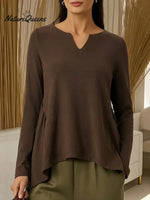 Women's Solid Color V-neck Long-sleeved Casual Loose-fitting Top With Irregular Hem.