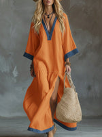 Loose And Cozy Patchwork Denim Dress With Contrasting Trim.