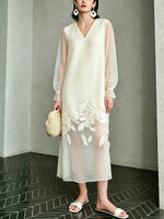 Vestido largo transparente de manga larga con estampado floral y diseño de patchwork para mujer.