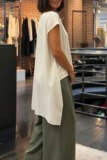 Artistically Cut Long Shirt With Irregular Hem