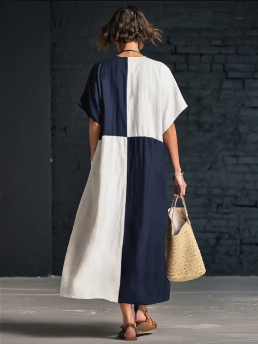 Elegante vestido midi holgado de lino y algodón con bloques de color.