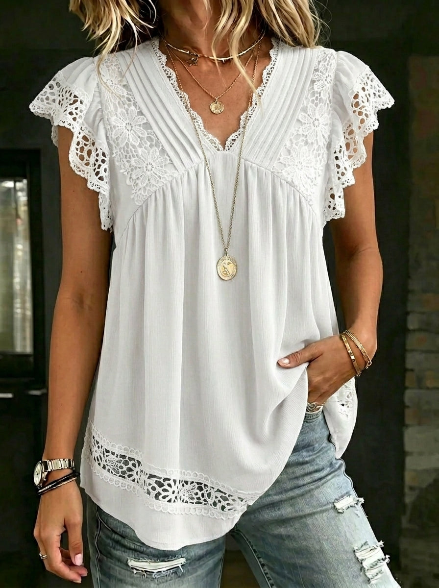 Camisa informal de mujer con encaje floral y aberturas