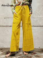 Women's Solid Color High-waisted Drawstring Wide-leg Pants Made Of Cotton And Linen Blend.