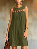Stylish And Elegant Pleated Dress Featuring Bead-accented Paneling.