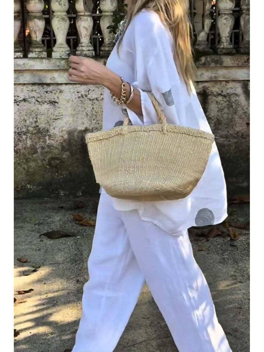 Two-piece Set Featuring A Loose, Casual Polka-dot Print Linen-cotton Top And White Trousers.