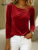 Women's Velvet Top With Decorative Metal Buckles.