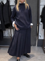 Women's Solid Color Stand-collar Long-sleeved Loose-fitting Knitted Top And High-waisted Loose A-line Skirt Set.