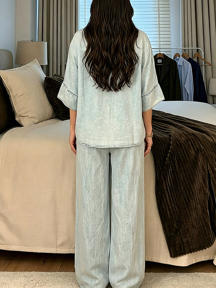 Conjunto de ropa de estar por casa para mujer: camisa holgada de manga corta con botones y pantalón de pierna ancha con cintura elástica.