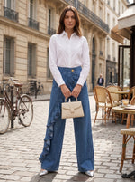 Pantalones vaqueros de mujer con un solo volante.