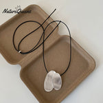 Women's Irregular Brushed Metal Pendant Pull-out Black Rope Necklace