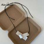 Women's Irregular Brushed Metal Pendant Pull-out Black Rope Necklace