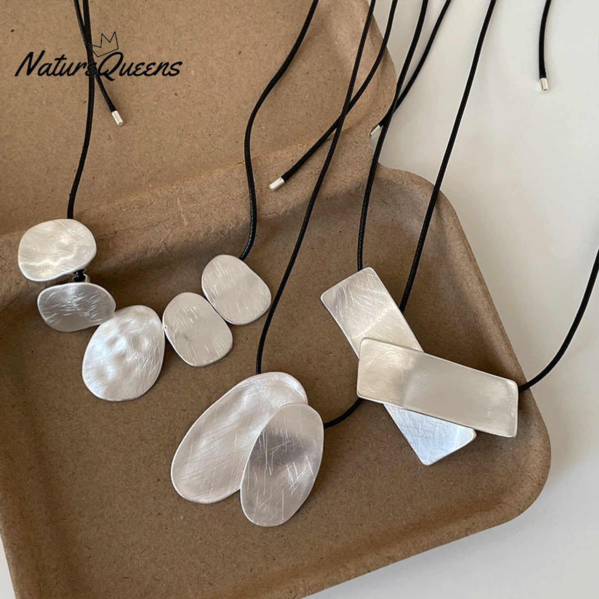 Women's Irregular Brushed Metal Pendant Pull-out Black Rope Necklace