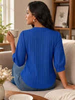 Lace-paneled V-neck Blouse Featuring Vertical Pleats, A Fitted Waist, And Puff Three-quarter Sleeves
