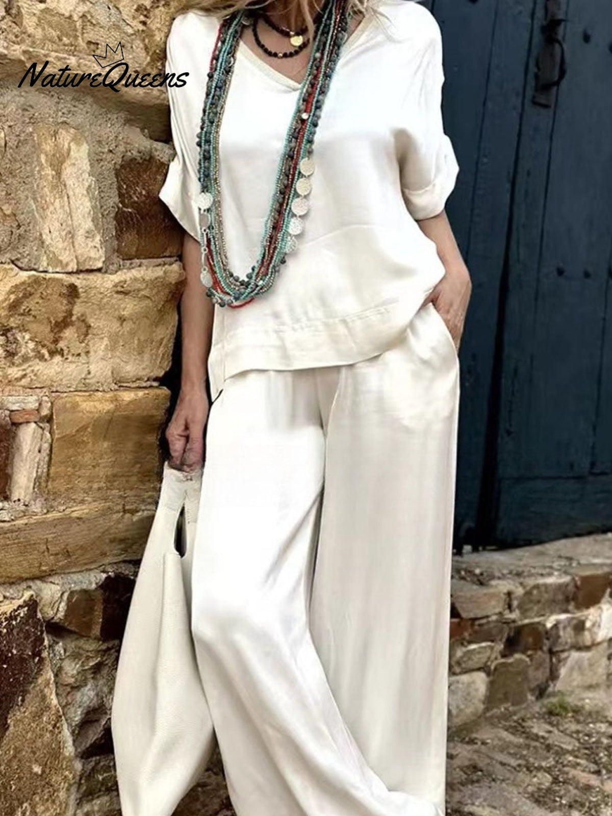 Women's Solid Color Loose Elegant Casual V-neck Mid-sleeve Suit