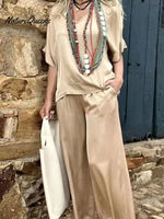 Women's Solid Color Loose Elegant Casual V-neck Mid-sleeve Suit