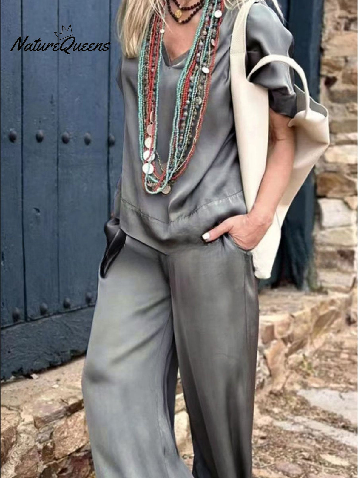 Women's Solid Color Loose Elegant Casual V-neck Mid-sleeve Suit