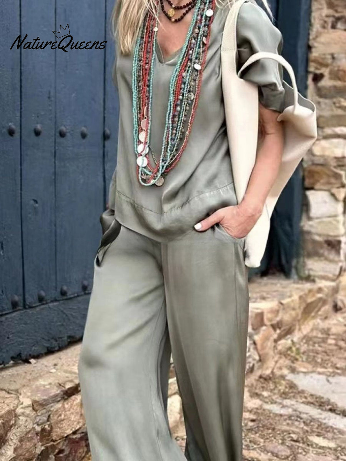 Women's Solid Color Loose Elegant Casual V-neck Mid-sleeve Suit