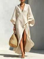 Vestido largo holgado de mujer con escote en V y mangas murciélago, ideal para vacaciones.