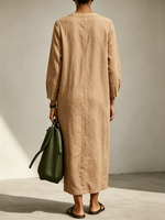 Henry-neck Midi Dress In A Cotton-linen Blend, Featuring A Straight Cut, Three-quarter Sleeves, And Large Patch Pockets.