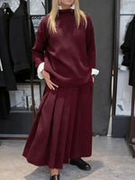 Women's Solid Color Stand-collar Long-sleeved Loose-fitting Knitted Top And High-waisted Loose A-line Skirt Set.