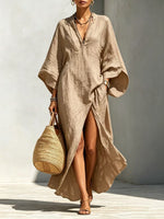 Vestido largo holgado de mujer con escote en V y mangas murciélago, ideal para vacaciones.