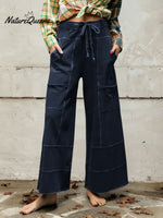 Women's Solid Color High-waisted Drawstring Wide-leg Pants Made Of Cotton And Linen Blend.