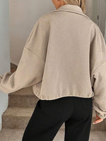 Women's High-neck Zippered Hem Drawstring Pocket Loose Coat