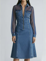 A Stylish Denim Dress With Mesh Sleeve Paneling.