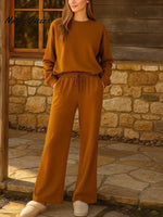 Women's Solid Color Round Neck Long Sleeve Casual Loose Top with Elastic Waist and Wide Leg Pants Set