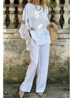 Two-piece Set Featuring A Loose, Casual Polka-dot Print Linen-cotton Top And White Trousers.