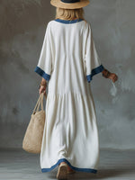 Loose And Cozy Patchwork Denim Dress With Contrasting Trim.