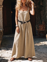Vestido largo bohemio de algodón con tirantes holgados y bolsillos.
