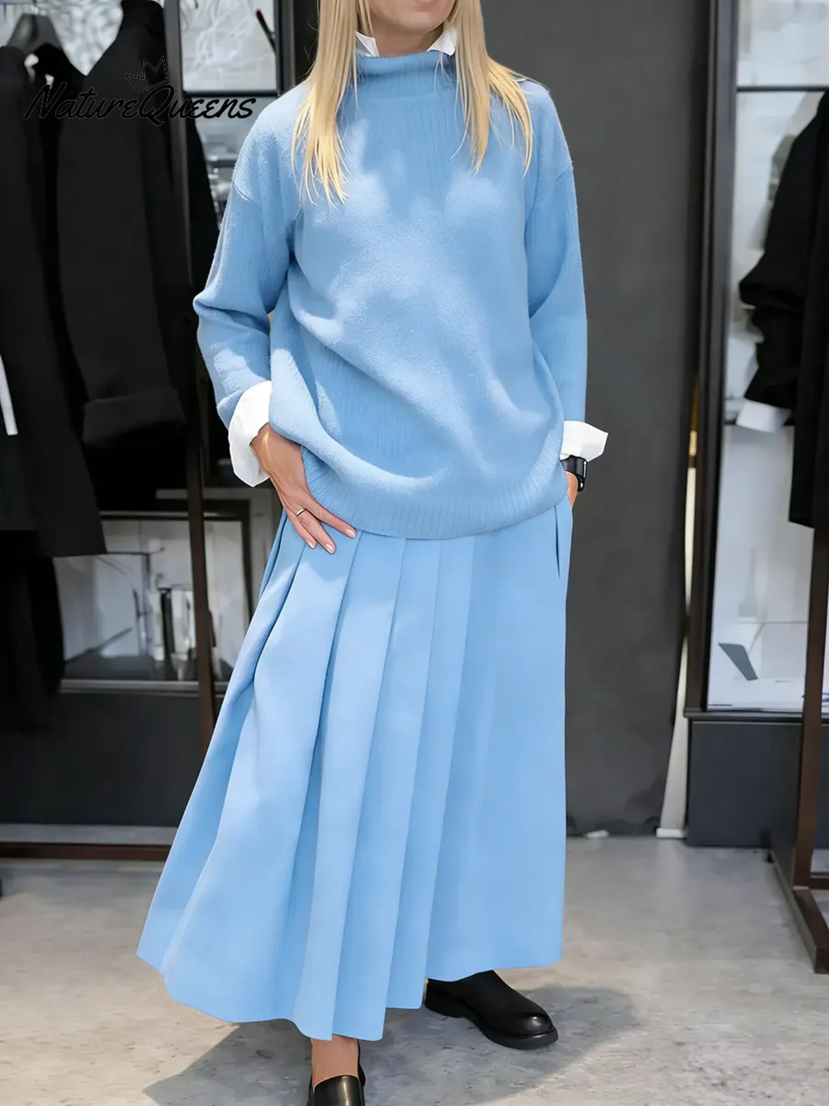 Women's Solid Color Stand-collar Long-sleeved Loose-fitting Knitted Top And High-waisted Loose A-line Skirt Set.