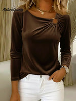 Women's Velvet Top With Decorative Metal Buckles.