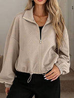 Women's High-neck Zippered Hem Drawstring Pocket Loose Coat