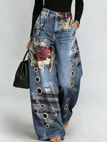 Rose-print Distressed Wide-leg Jeans With Frayed Hems And Metal Eyelets