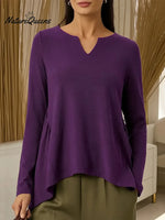 Women's Solid Color V-neck Long-sleeved Casual Loose-fitting Top With Irregular Hem.